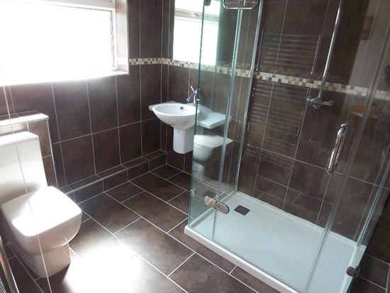 Slate style tiled shower room with rectangular shower